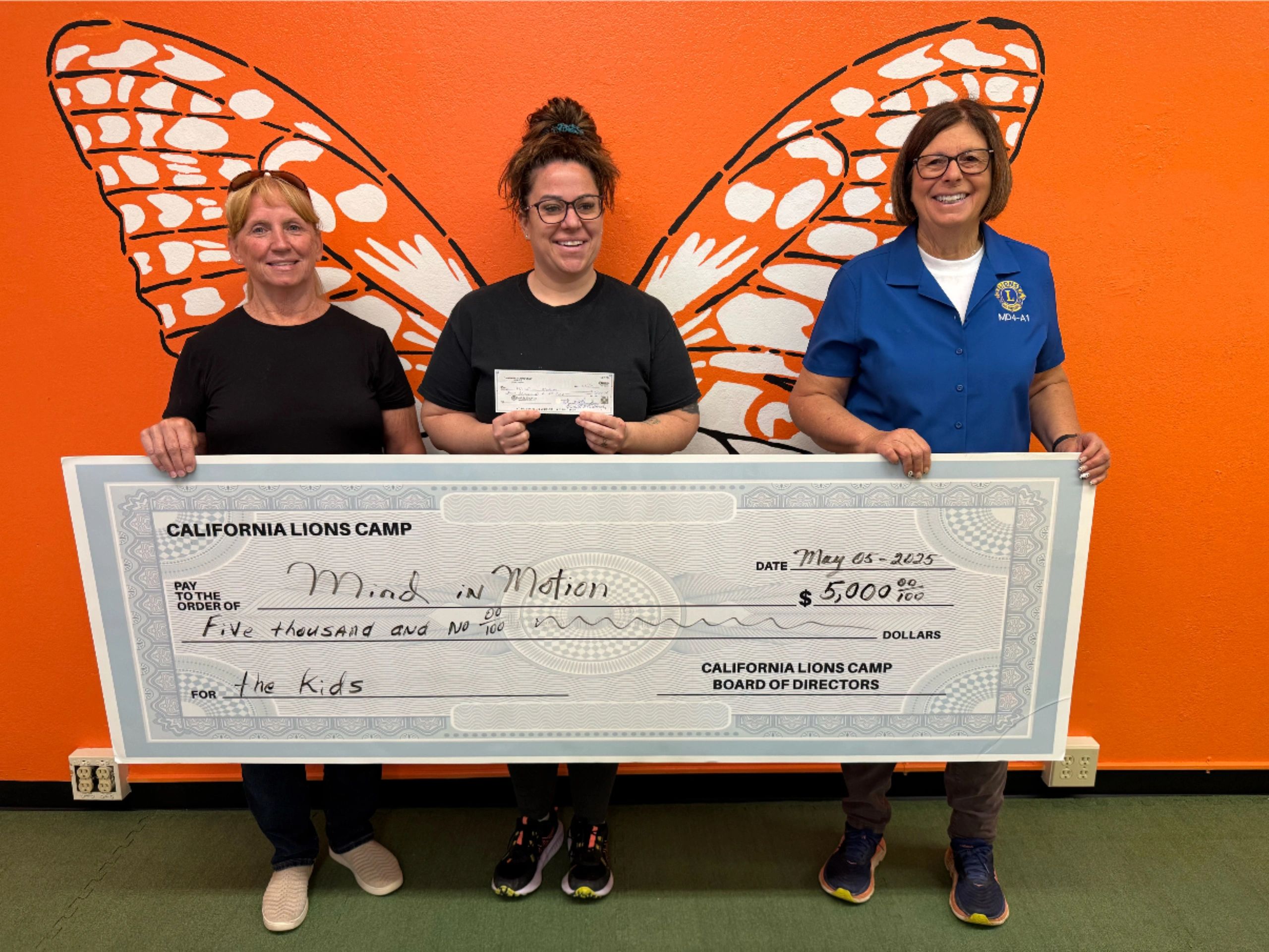 California Lions Camp $5,000 donation check presented to Mind in Motion